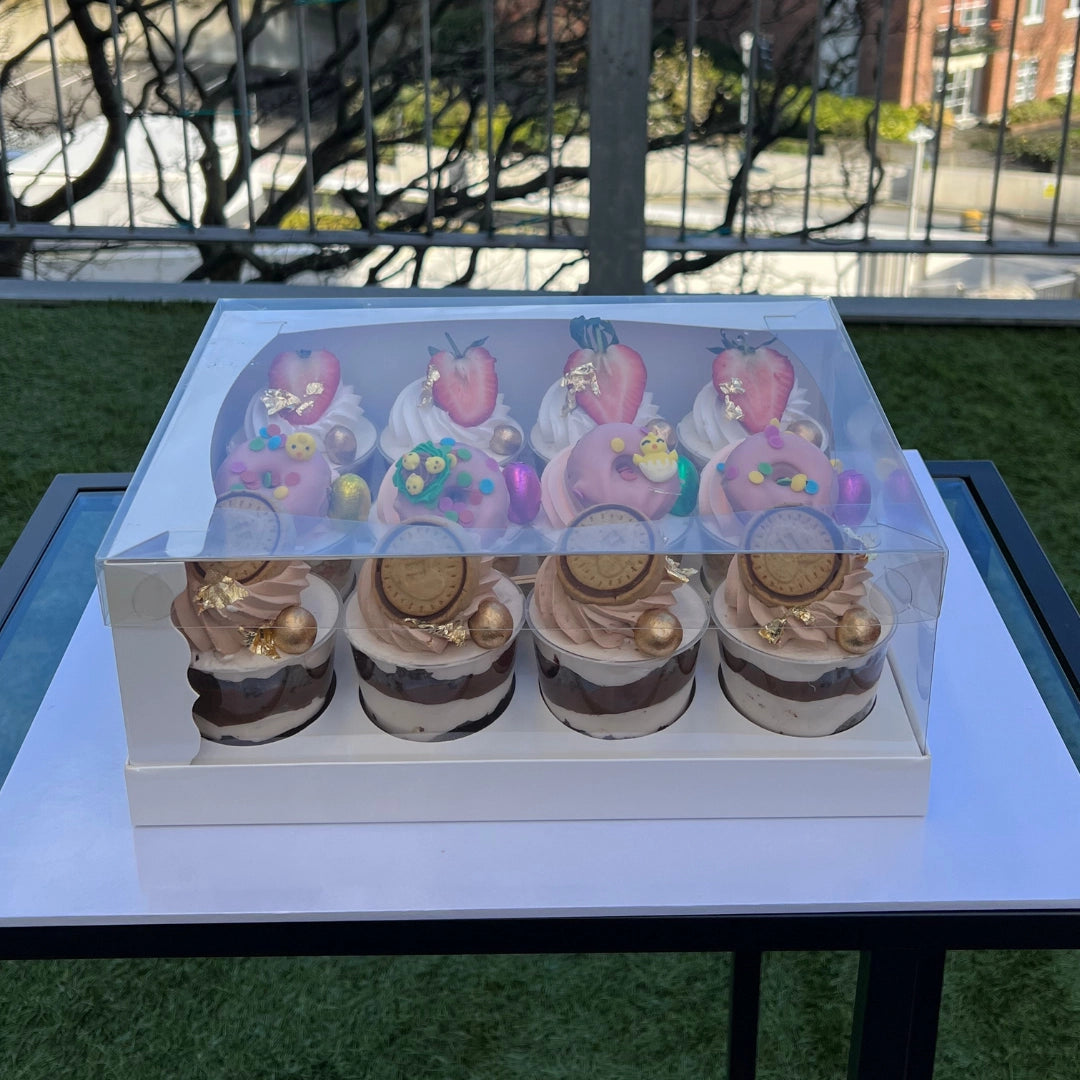 12 CHEESE CAKE SHOOTERS WITH DIFFERENT TOPPINGS IN CAKEMEAWAY EXTRA TALL CUPCAKE BOX