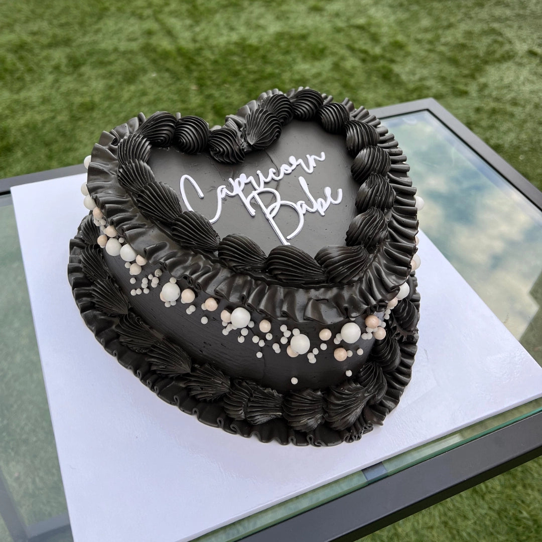 BLACK HEART SHAPED CAKE WITH PEARLS