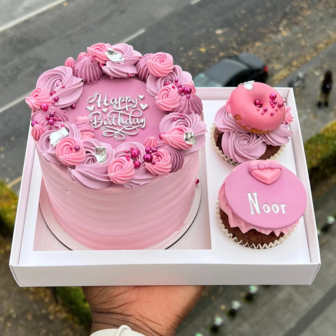Pink and lilac bento cake with 2 cupcakes