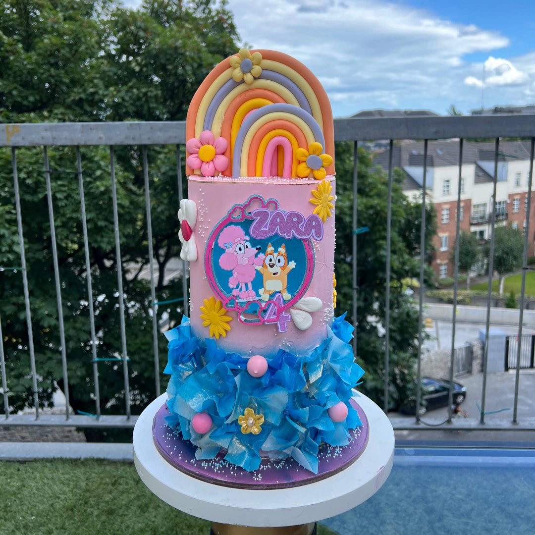 Bluey cake with rainbows
