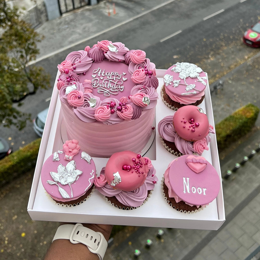 Pink and lilac bento cake with 5 cupcakes