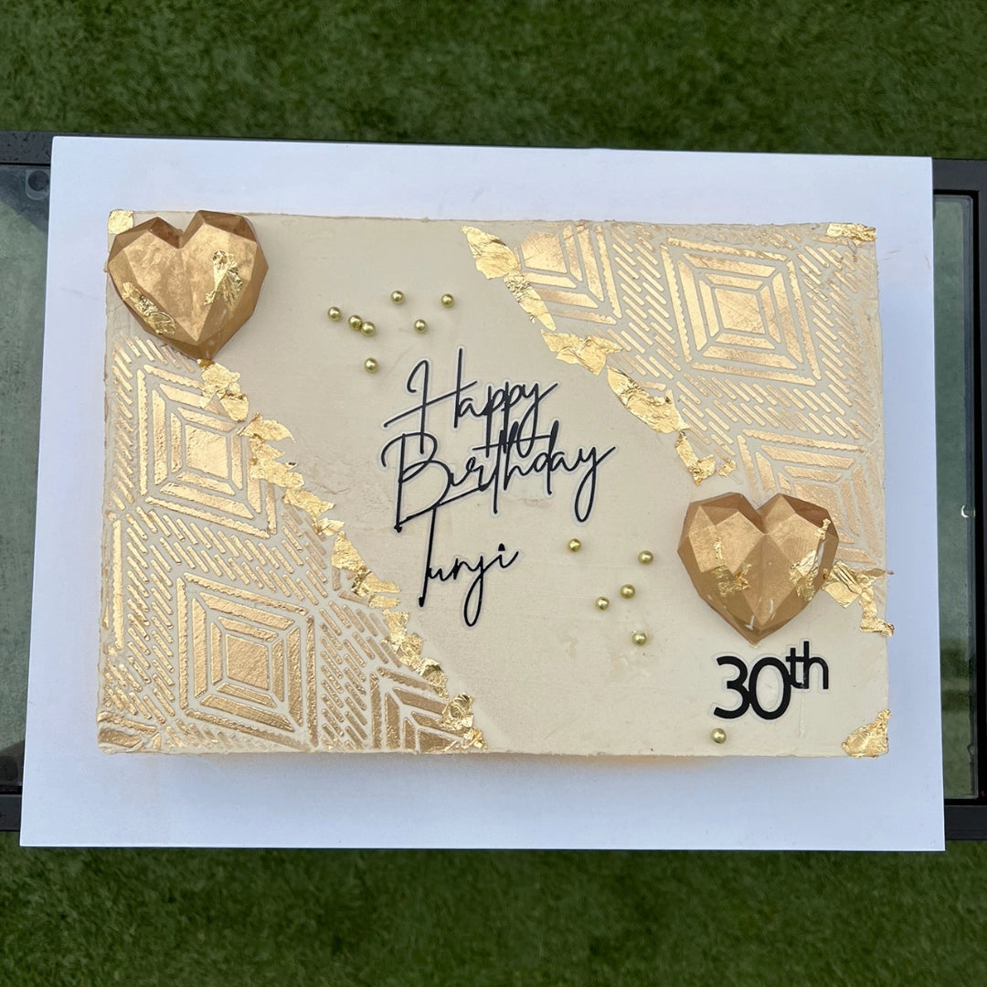 Cream and gold half sheet buttercream cake