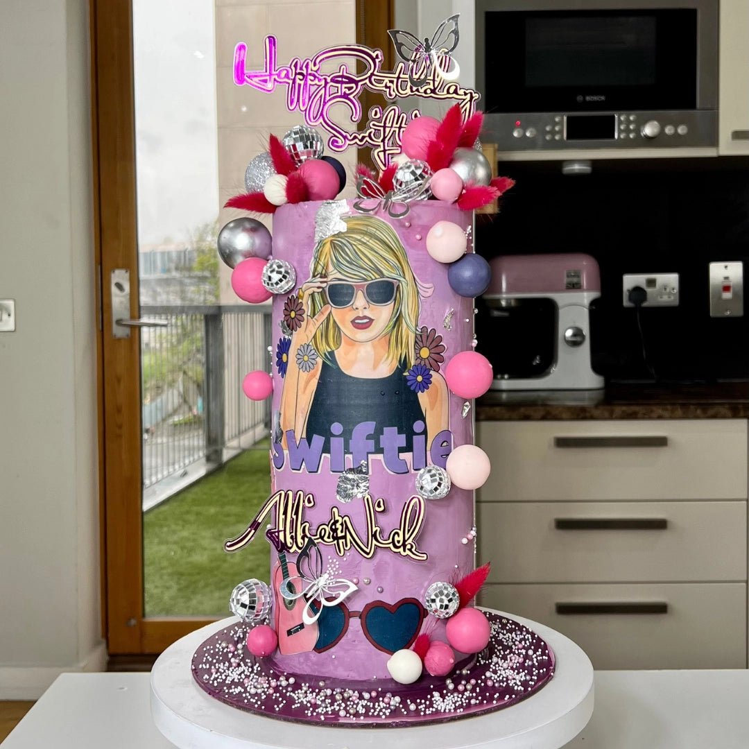 Tall silver and Lilac Taylor swift cake