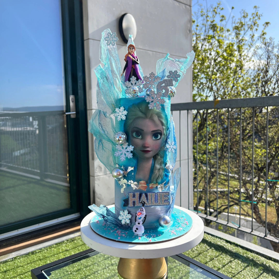 elegant tall frozen Cake with elsa