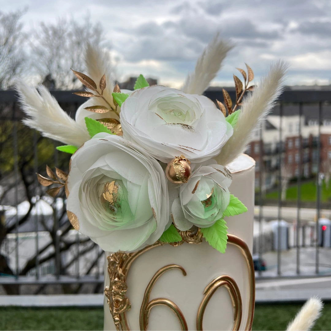 elegant white and gold 60th birthday Cake