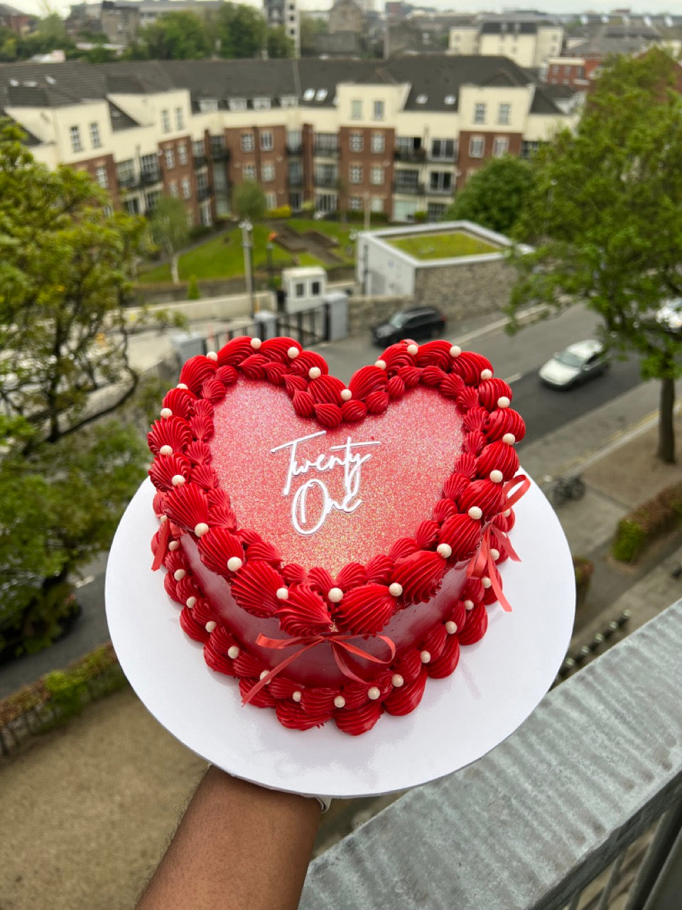 red vintage heart cake with bows