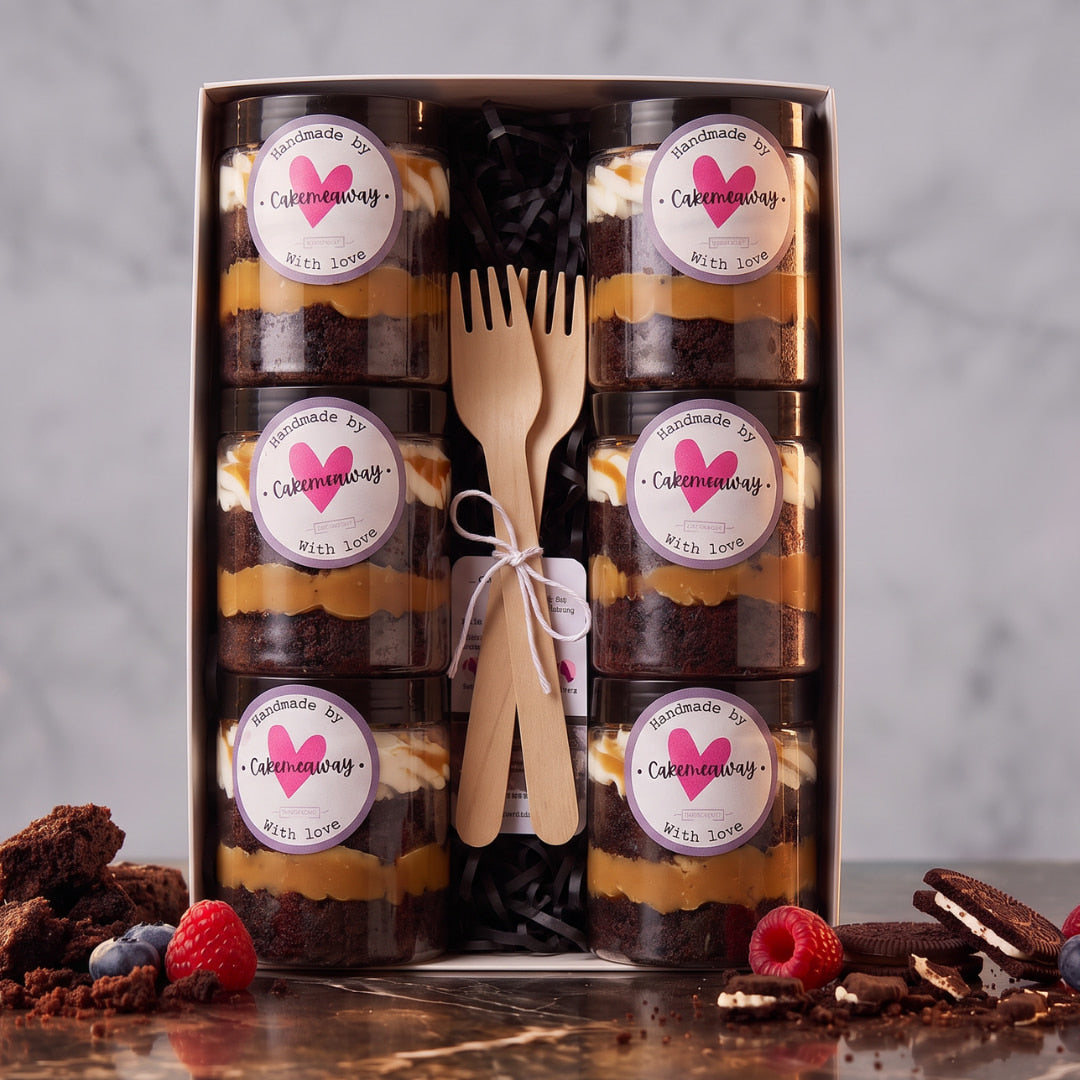 Chocolate caramel cake jars in a box of 6 with cream swirls, black lids and two wooden forks tied with twine, CakeMeAway Dublin