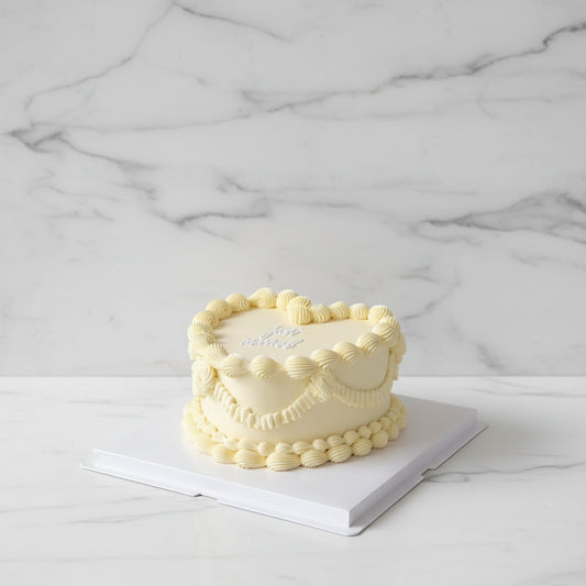 wedding cake in heart shaped vintage style 