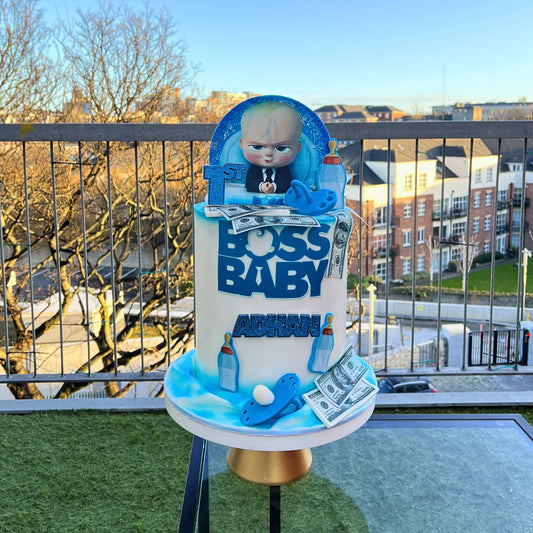 boss baby cake on a balcony