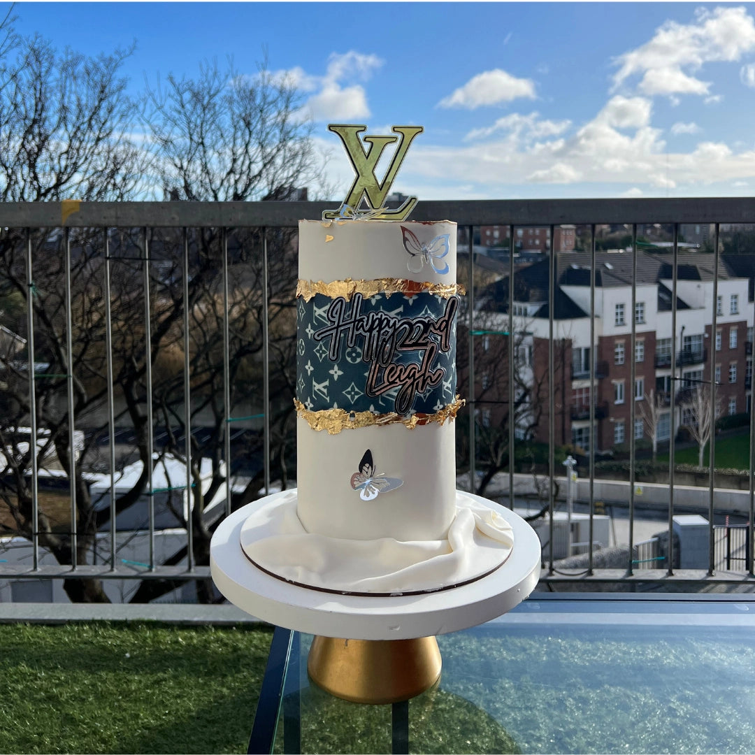 designer cake with edible dollars