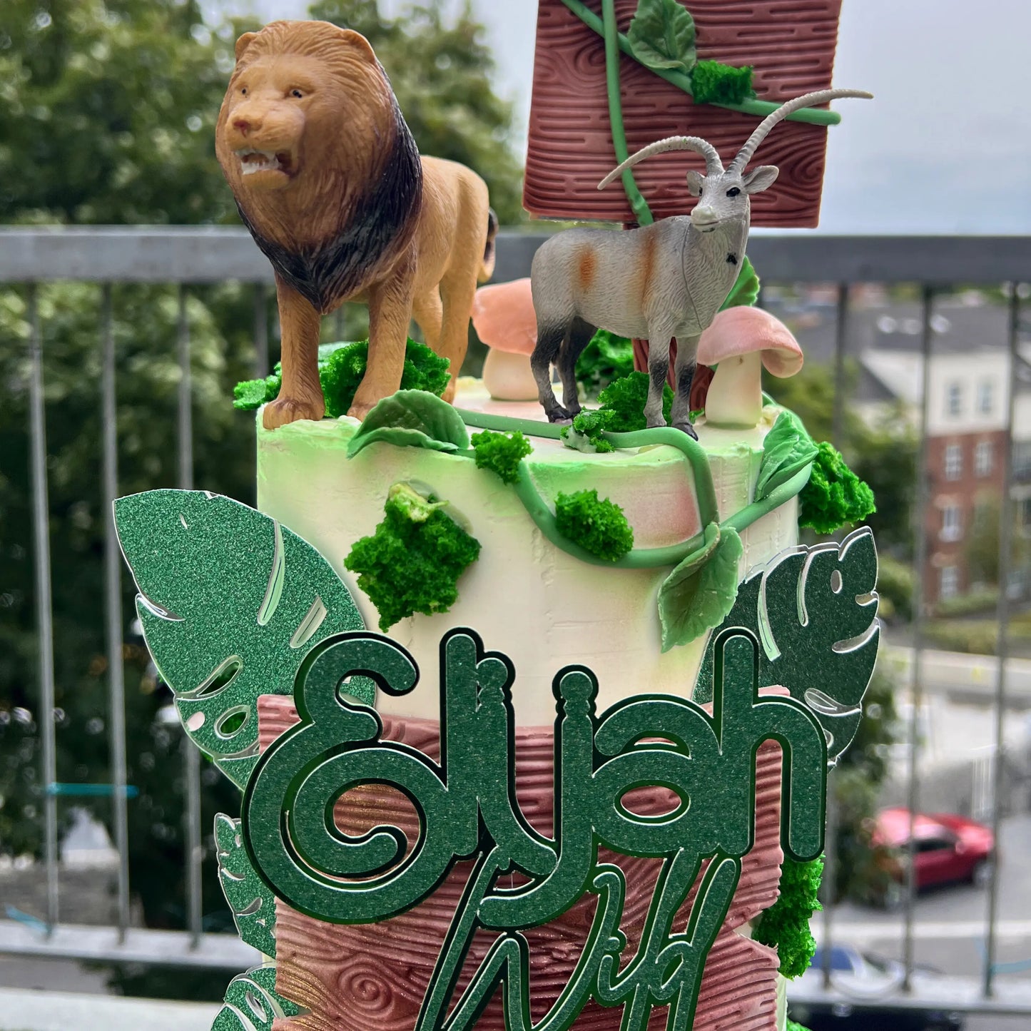 green safari animal birthday cake