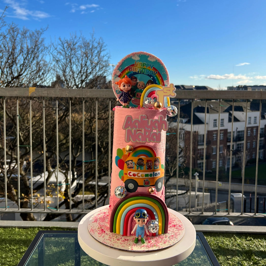 Designer Cocomelon themed cake for a high-end 1st birthday party in South Dublin, featuring artistic watermelon motifs.